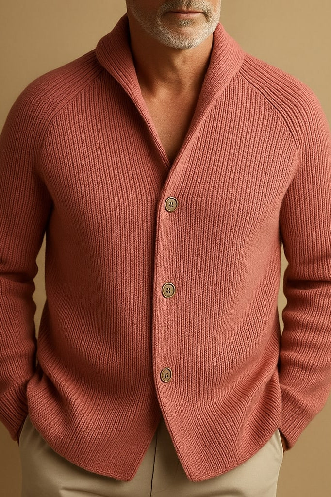 Full-length shot of a man wearing the Florian wool blend cardigan, styled with jeans for a relaxed autumn look.
