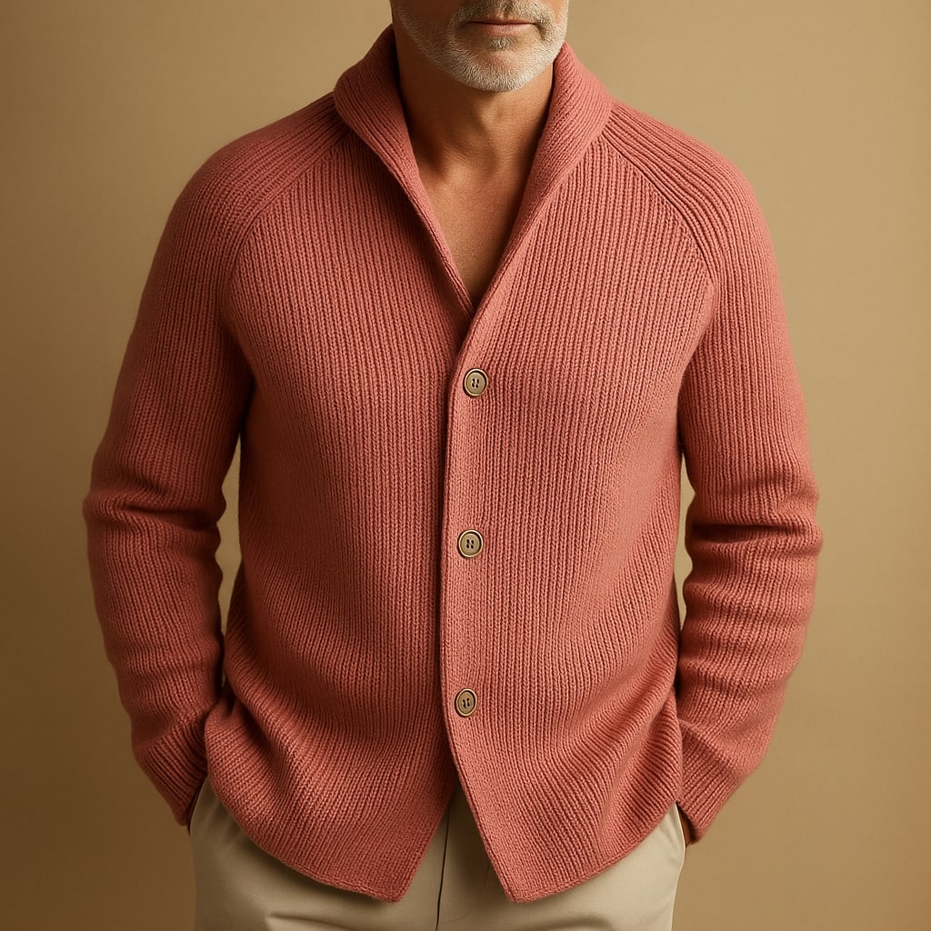 Full-length shot of a man wearing the Florian wool blend cardigan, styled with jeans for a relaxed autumn look.