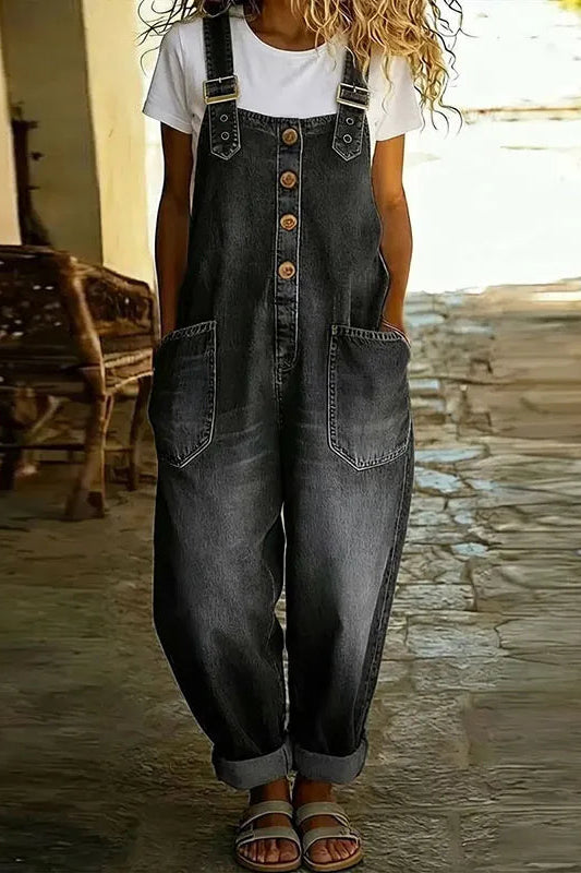 Back view of the black Hadley soft denim overalls, emphasizing the strap design and overall comfortable fit.