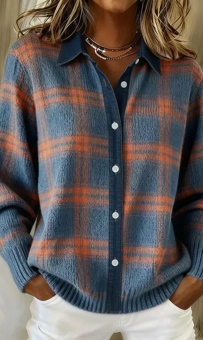 Front view of an Inez button-up cardigan in a vibrant orange shade, showcasing its relaxed drape.