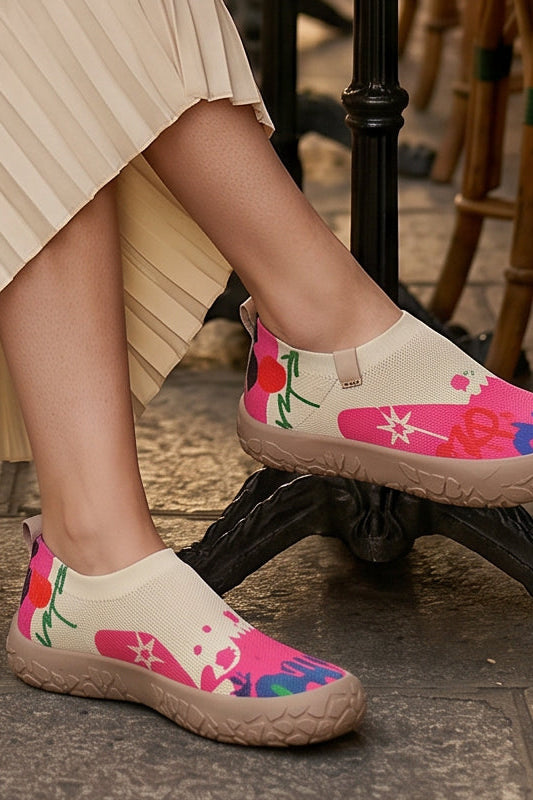 Inez artistic slip-on shoes in fuchsia floral print, front view on a clean background.