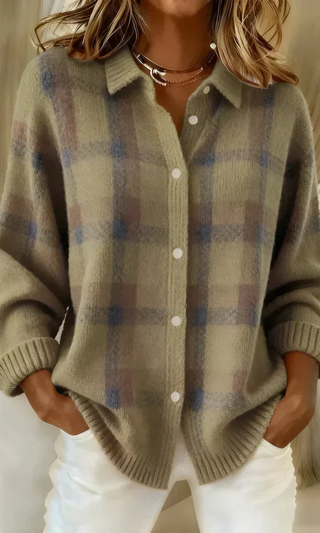 Model wearing an Inez button-up cardigan in blue, styled casually for a comfortable look.