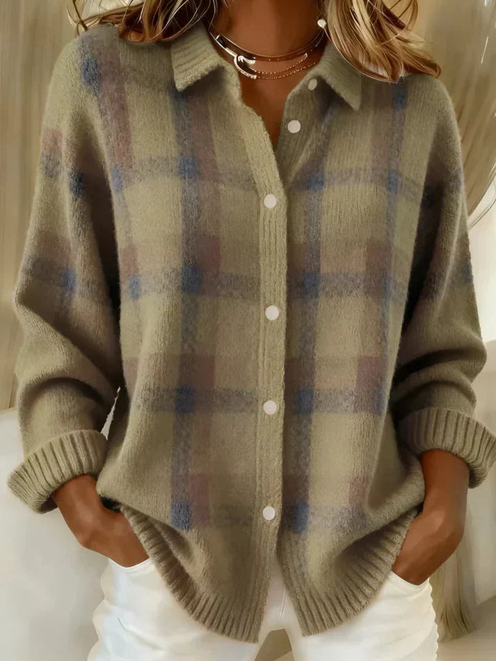 Model wearing an Inez button-up cardigan in blue, styled casually for a comfortable look.
