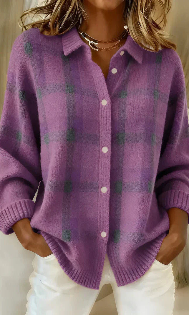 Lifestyle shot of the Inez button-up cardigan in purple, worn outdoors for a relaxed, confident appearance.