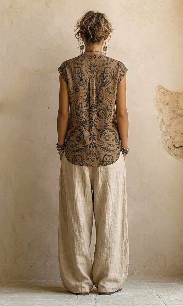 Lifestyle image of a woman wearing the Kiera wide-leg pants, demonstrating their versatile styling for a casual day out.