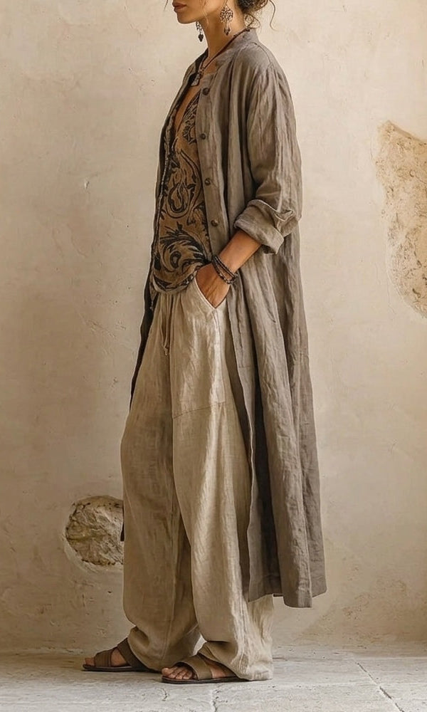 Side profile of the elegant wide-leg pants, emphasizing the flowy silhouette and modern design.
