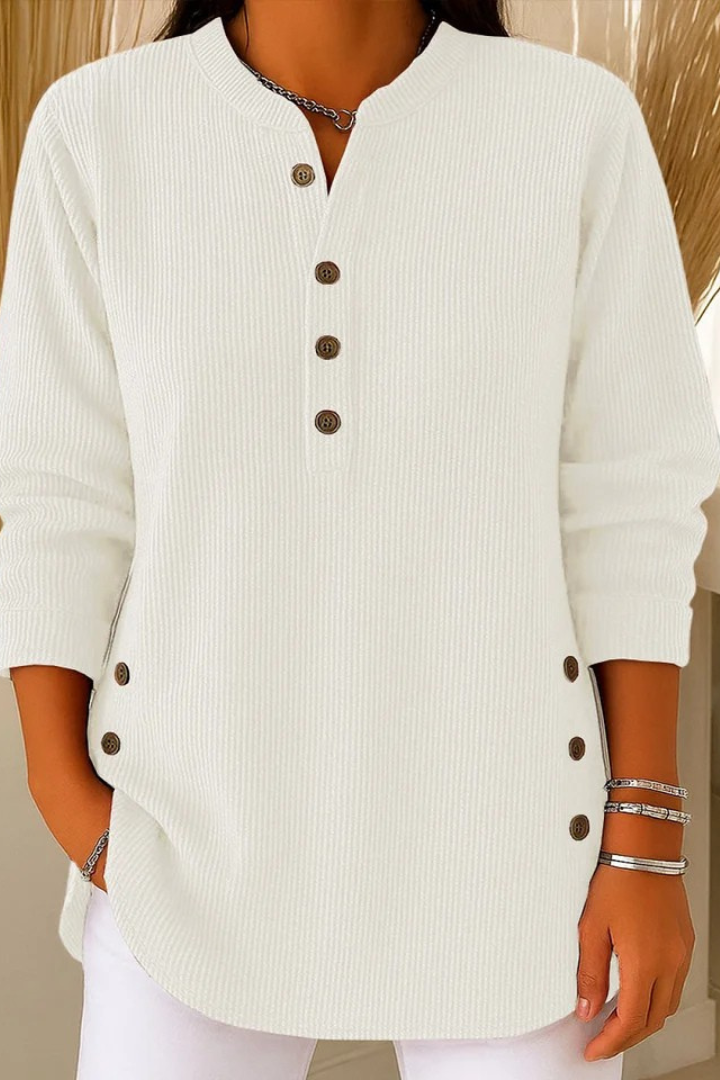 Detail of the waistband and any subtle design elements on the Kiera loose fit shorts.