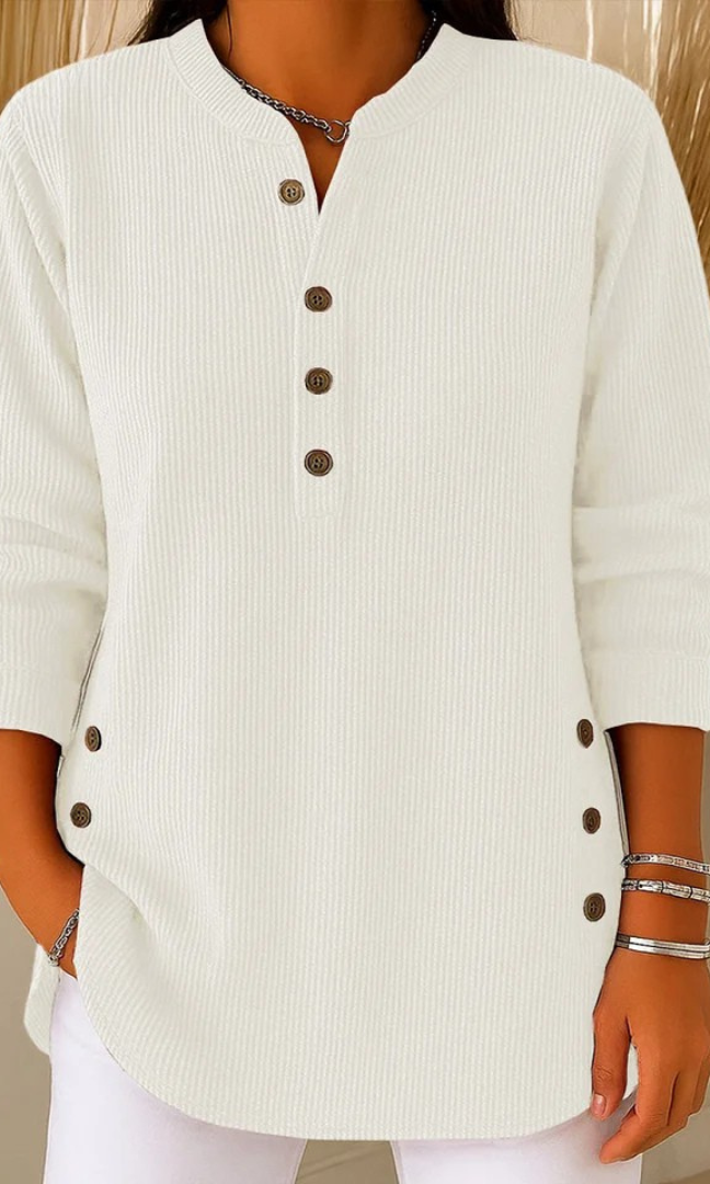 Detail of the waistband and any subtle design elements on the Kiera loose fit shorts.