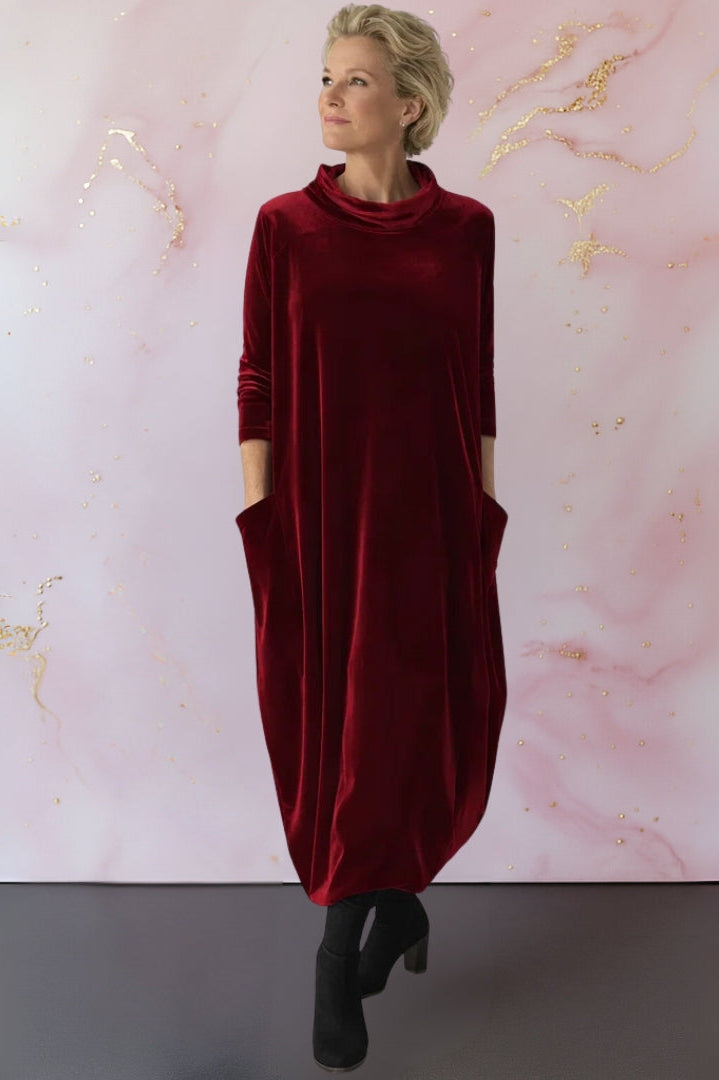 Close-up detail of the Leona velvet maxi dress's modern stand-up collar and luxurious fabric texture.