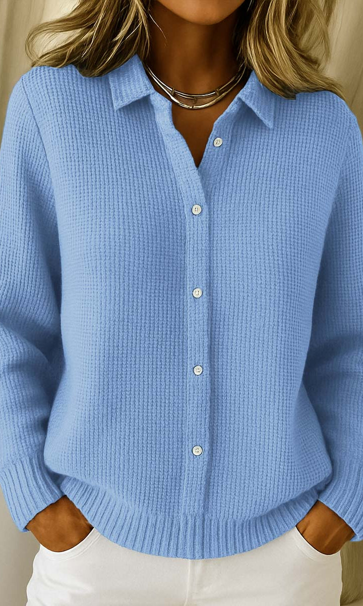Lila elegant knit cardigan in blue, front view, draped loosely on a mannequin.
