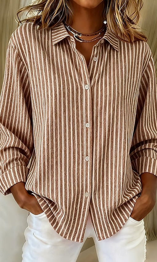 Detailed close-up of the khaki Linnea relaxed fit shirt fabric, showing the visible vertical stripes.