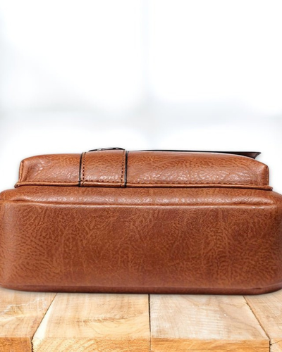 Back view of the Caleb minimalist shoulder bag, showing its clean lines and comfortable fit against the body.