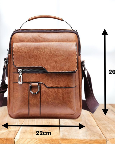 A man reaching into the Caleb shoulder bag, illustrating the ease of access to his essential belongings.