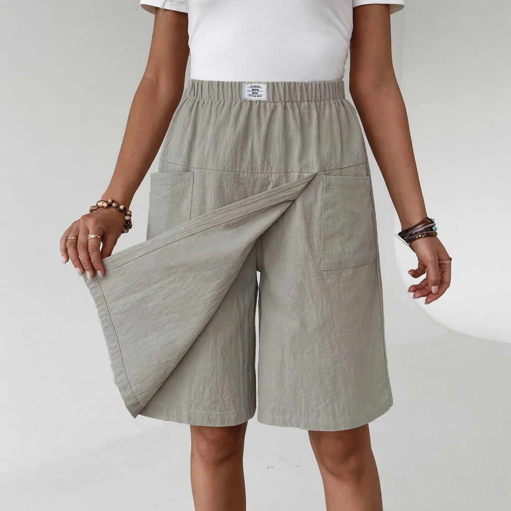 Front view of a model wearing the Lysandra versatile skort shorts in off-white, styled casually.