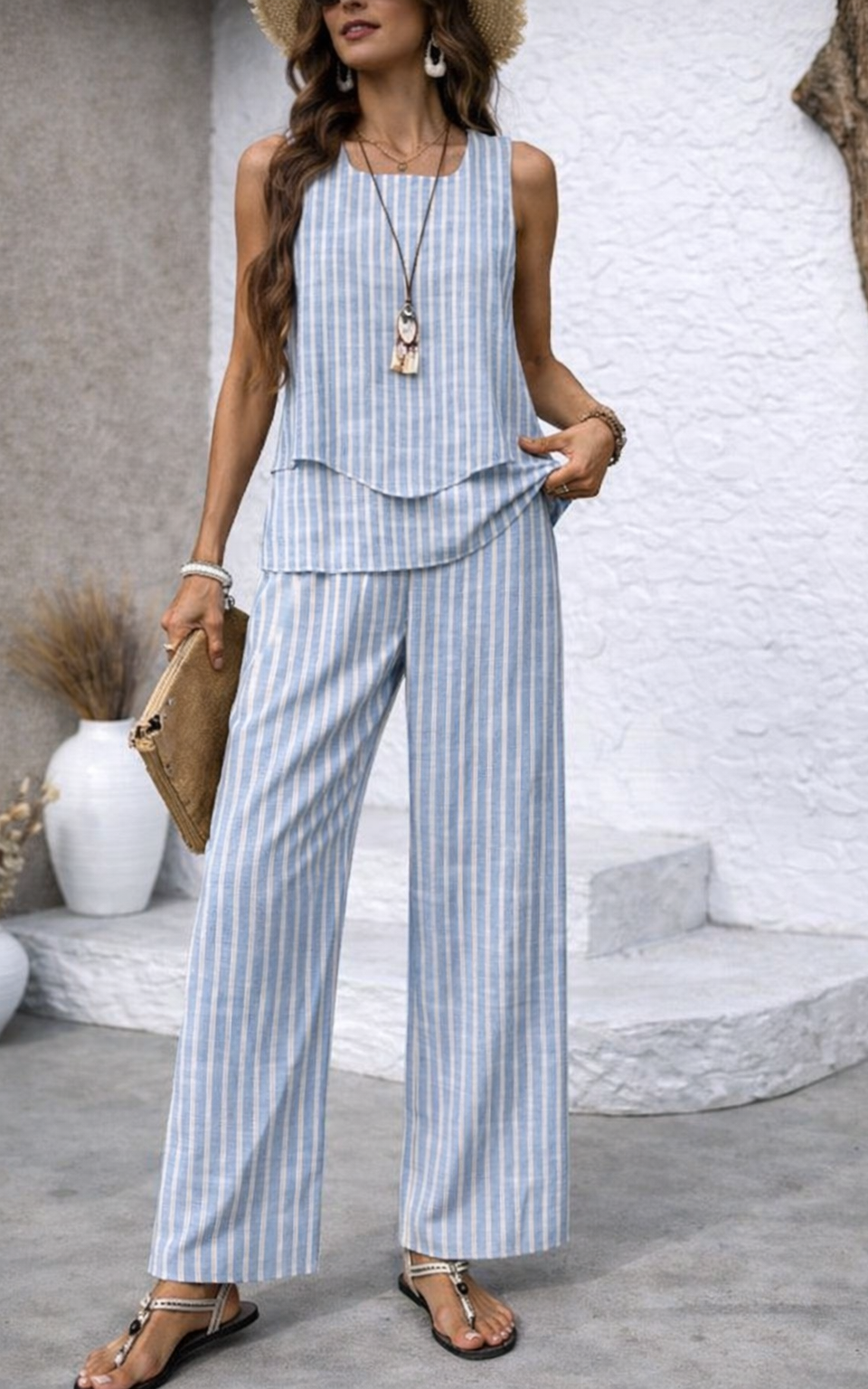 Full-length view of Maeve striped wide-leg pants in fresh blue tones, showcasing their relaxed fit and elegant vertical stripe design.