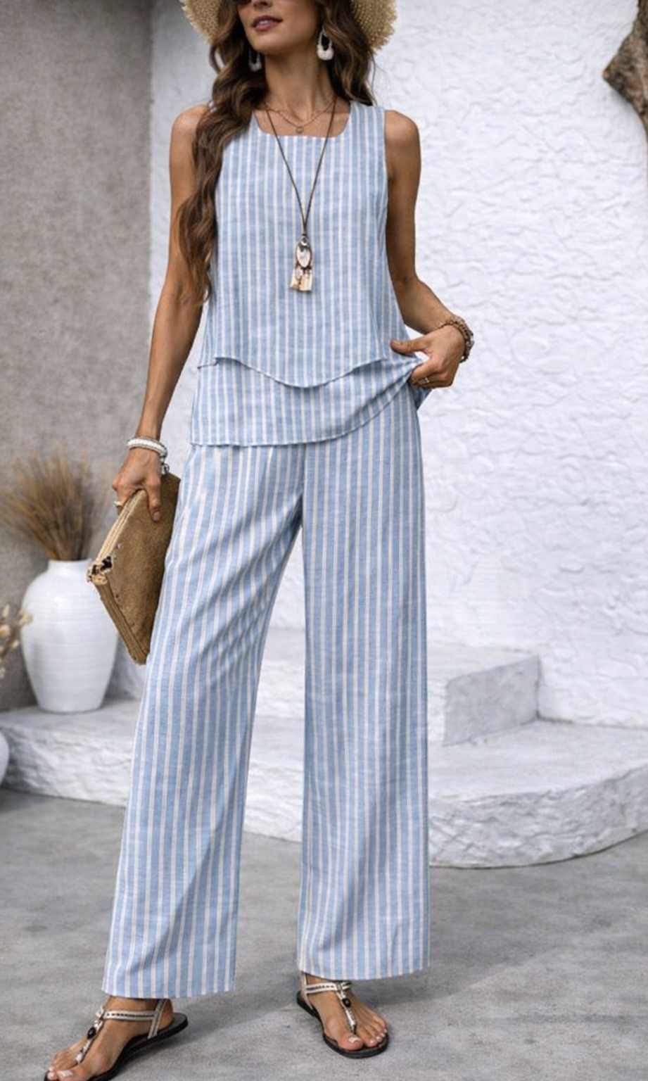 Full-length view of Maeve striped wide-leg pants in fresh blue tones, showcasing their relaxed fit and elegant vertical stripe design.