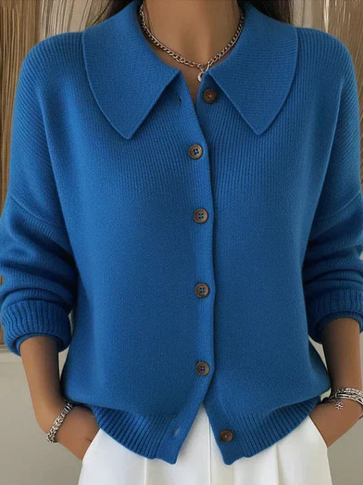 Front view of the Maeve classic button-up cardigan in blue, showcasing its loose fit and smooth knit.