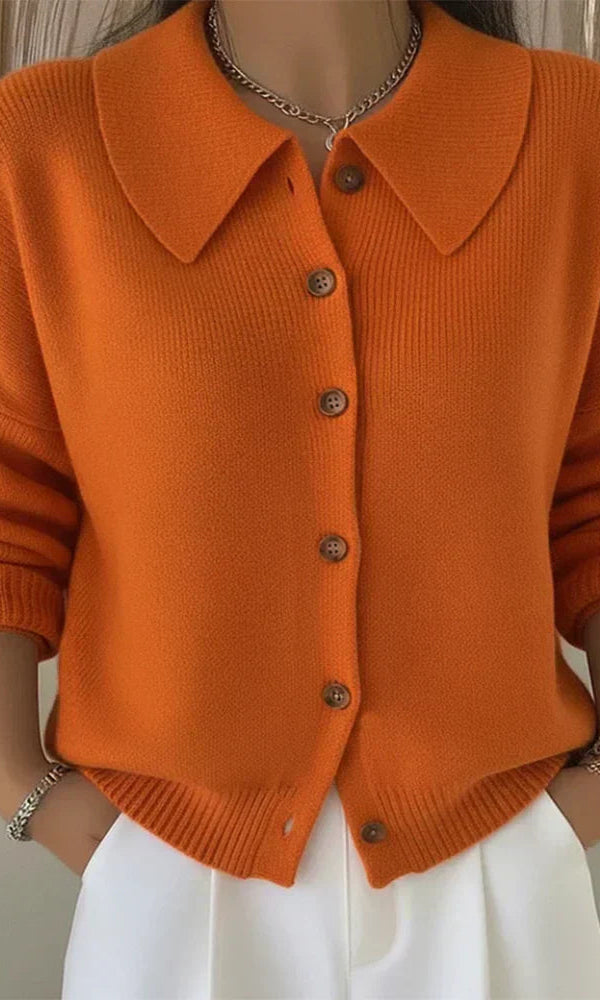 Close-up of the smooth knit texture and classic collar of the Maeve button-up cardigan.