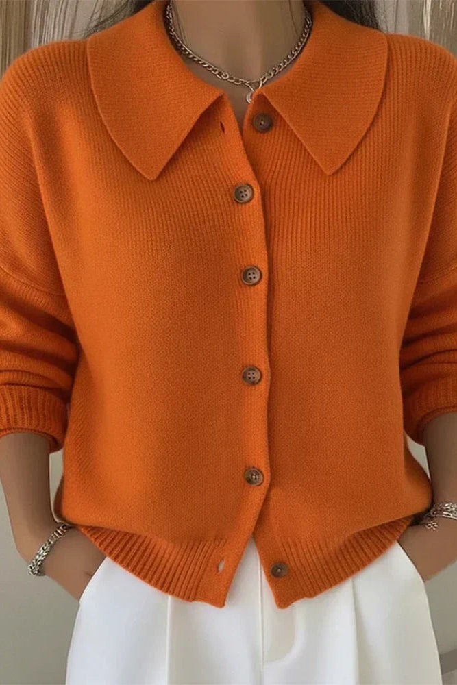 Close-up of the smooth knit texture and classic collar of the Maeve button-up cardigan.