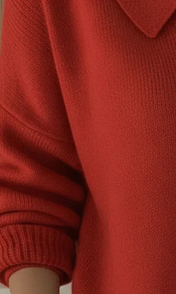 Detail shot of the button closure and hem finish on the Maeve classic button-up cardigan.