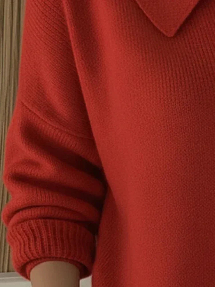Detail shot of the button closure and hem finish on the Maeve classic button-up cardigan.