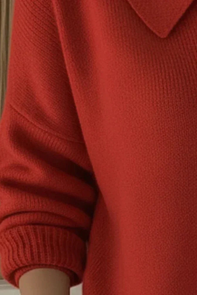 Detail shot of the button closure and hem finish on the Maeve classic button-up cardigan.