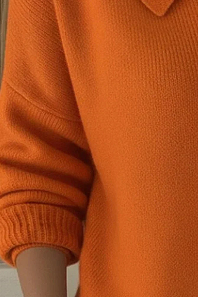 Back view of the Maeve classic button-up cardigan in orange, illustrating its harmonious line and relaxed silhouette.