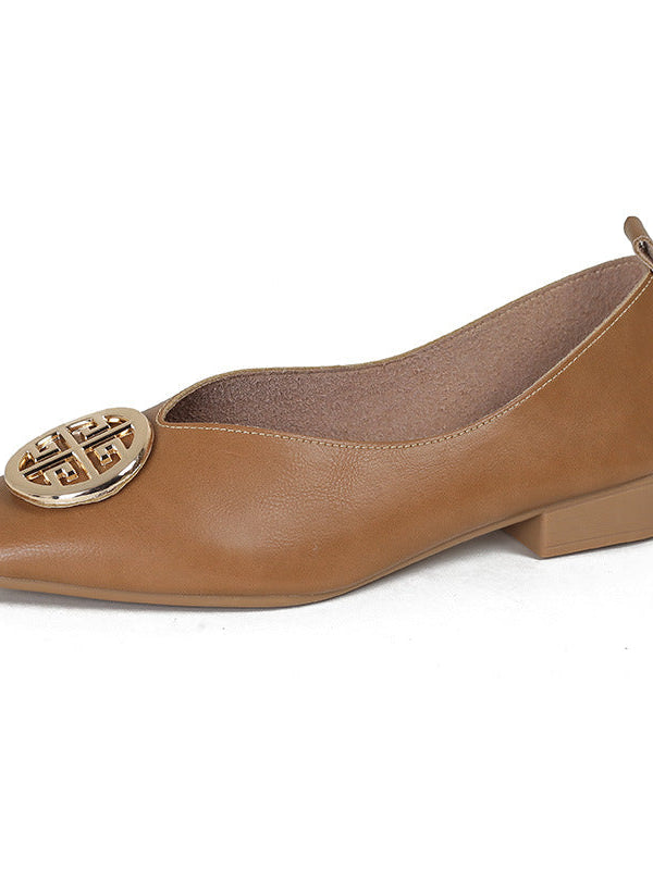 Bottom view of a green square-toe flat, showcasing the durable rubber outsole and stable heel structure for everyday wear.