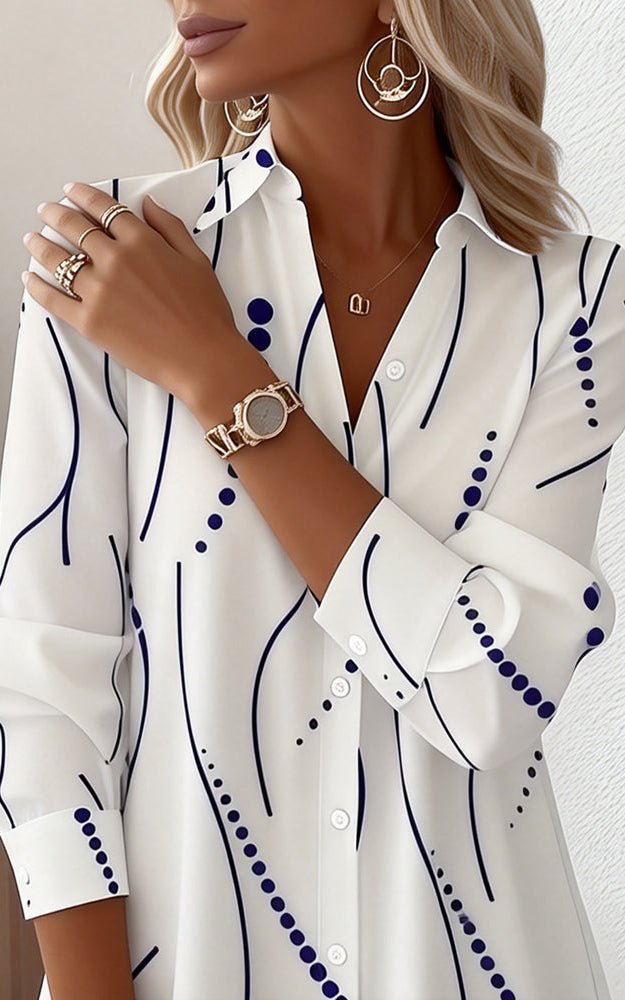 Lifestyle shot of the Kira striped A-line dress, styled casually for a spring or autumn day outing.