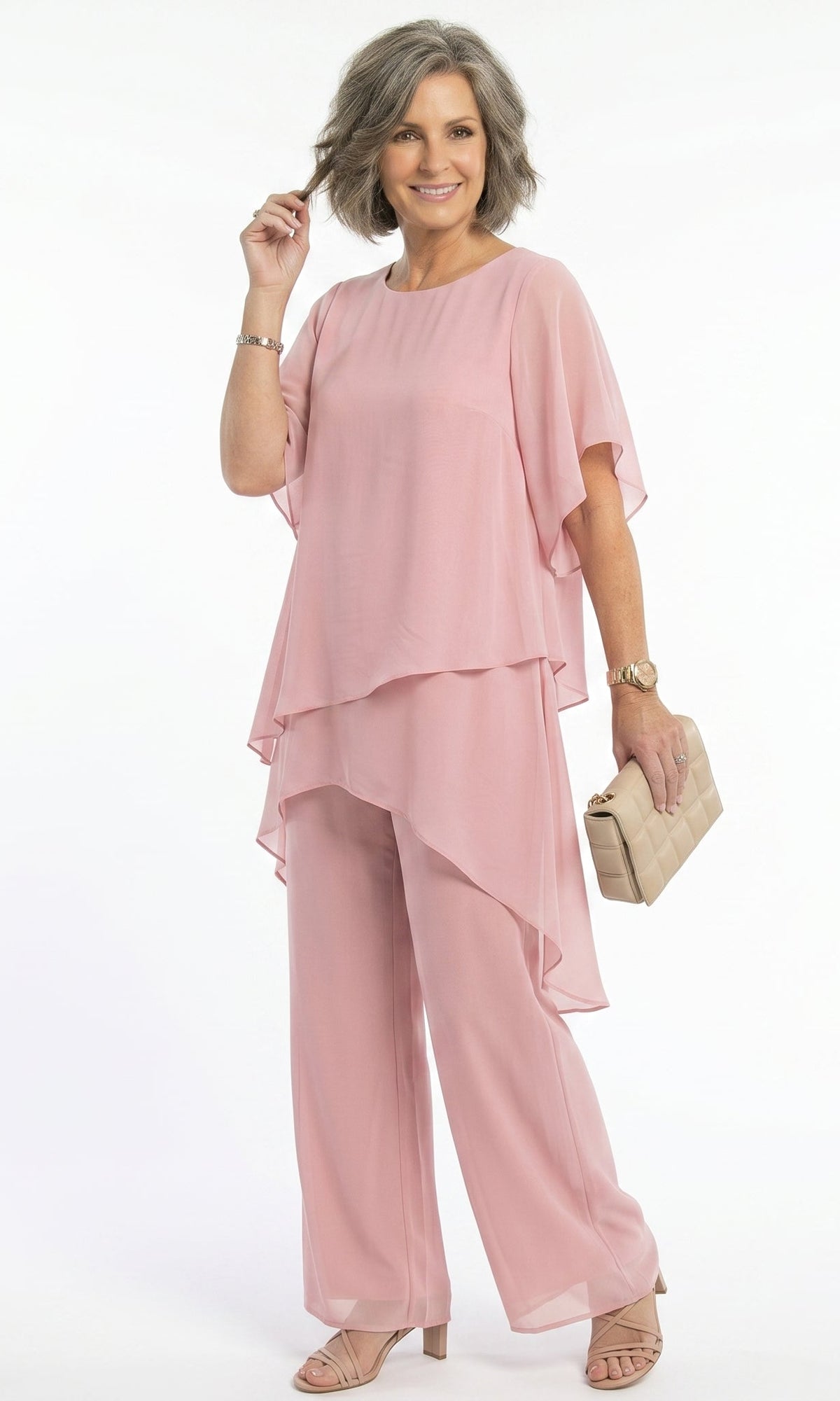 Full-length view of the teal Tamsin blouse, illustrating its versatile styling potential with various bottoms.