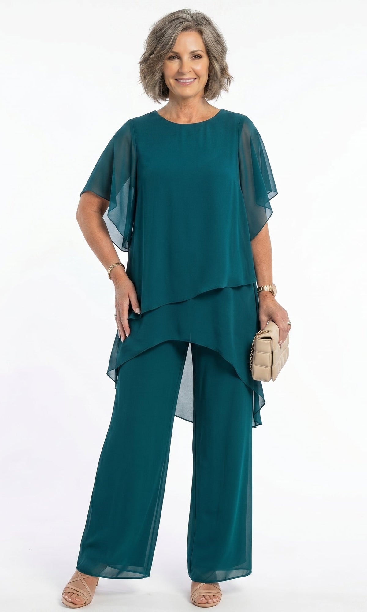 A lavender blouse displayed flat, clearly showing the short sleeves and delicate tiered construction.