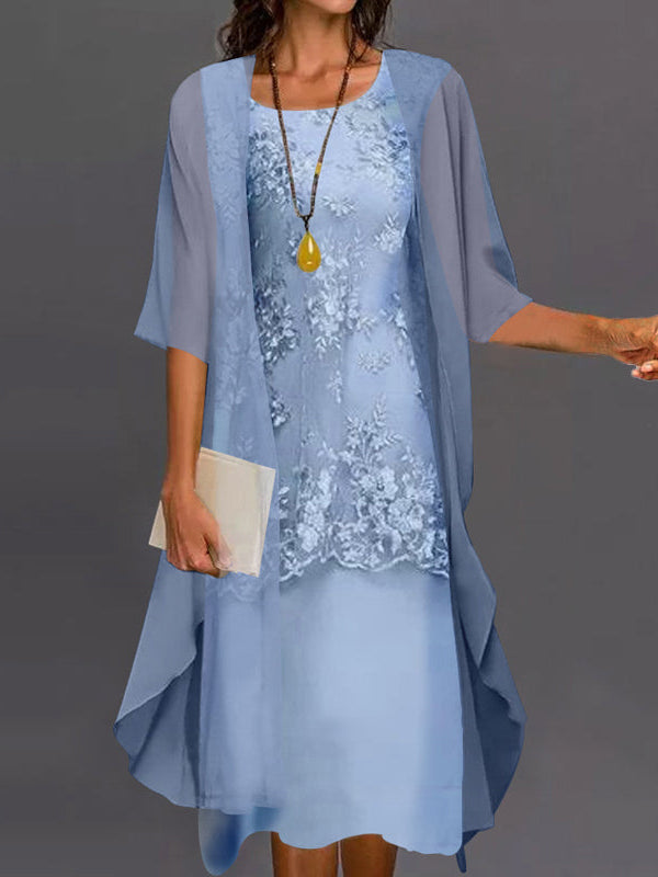 Elegant Noelle two-piece chiffon dress in blue, front view on a model, showcasing the flowing fabric.
