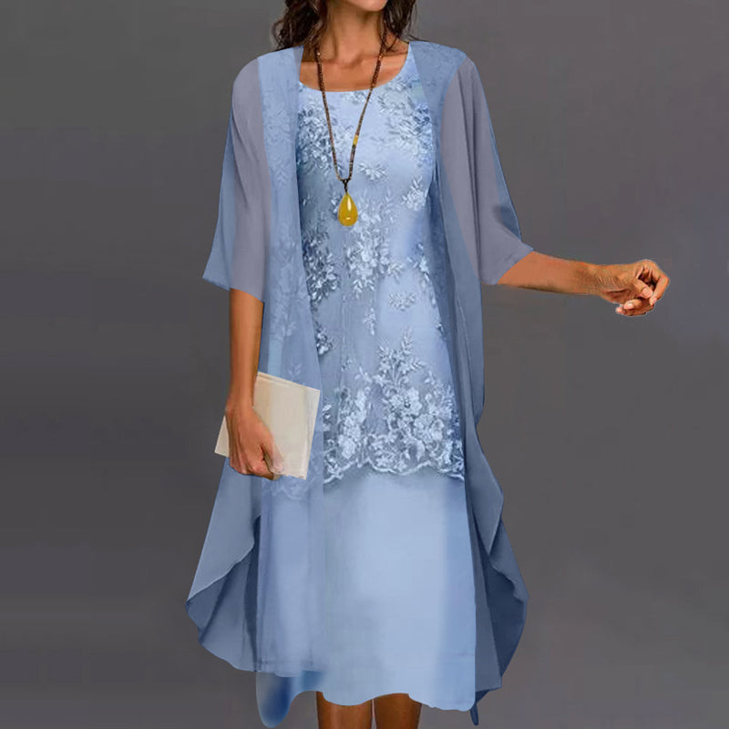 Elegant Noelle two-piece chiffon dress in blue, front view on a model, showcasing the flowing fabric.