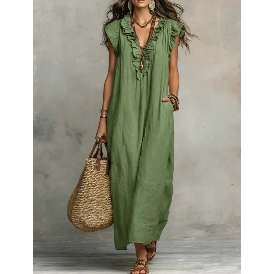 Side profile of the flowing silhouette of the bohemian long maxi dress, showcasing its graceful movement.