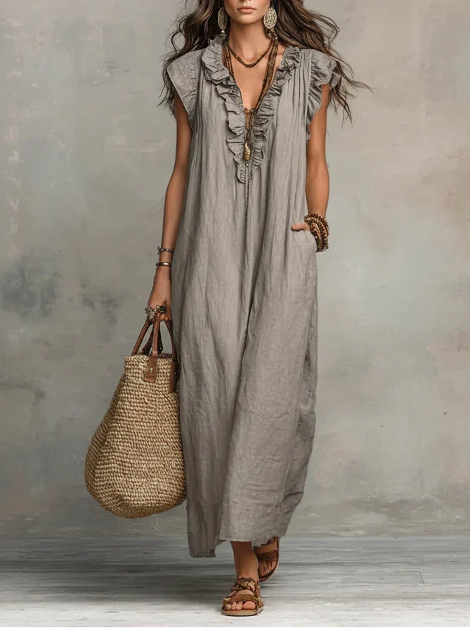 Full front view of a woman wearing the Saskia Bohemian Long Maxi Dress in a natural outdoor setting.