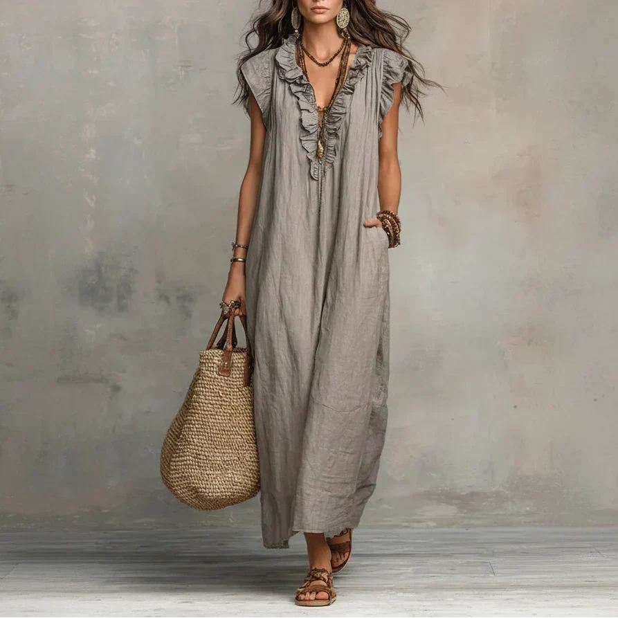 Full front view of a woman wearing the Saskia Bohemian Long Maxi Dress in a natural outdoor setting.