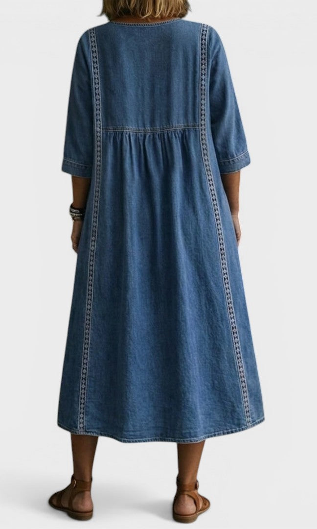 Side profile of a woman in the Romy denim jeans, highlighting the flowing cut and overall silhouette.