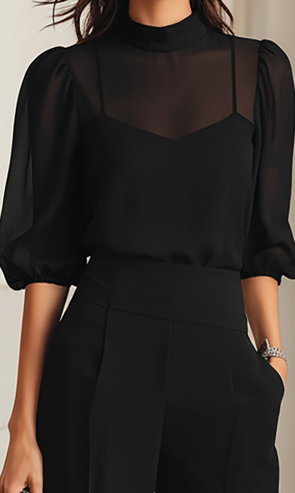 Back view of the black chiffon three-piece set, showing the graceful silhouette and the length of the sheer top.