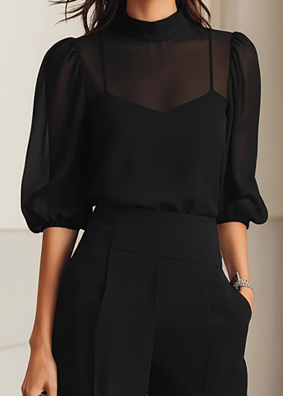 Back view of the black chiffon three-piece set, showing the graceful silhouette and the length of the sheer top.