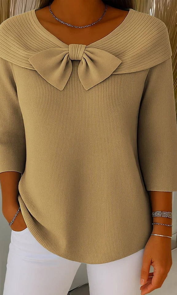 Close-up detail of the visible fine texture of the knit fabric on the Soraya tunic, emphasizing its quality and comfortable feel.