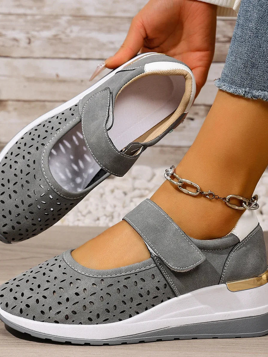 Side profile of a foot wearing a Soraya comfort arch support sandal, highlighting the elevated arch support.
