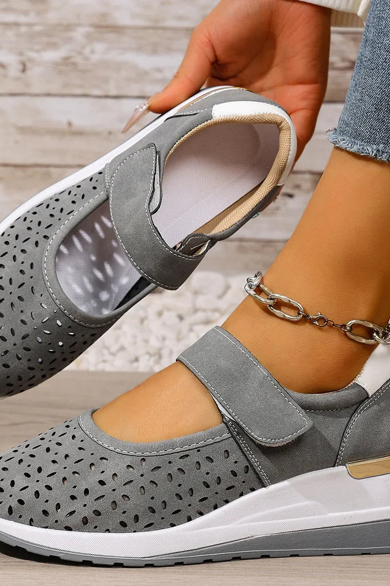 Side profile of a foot wearing a Soraya comfort arch support sandal, highlighting the elevated arch support.