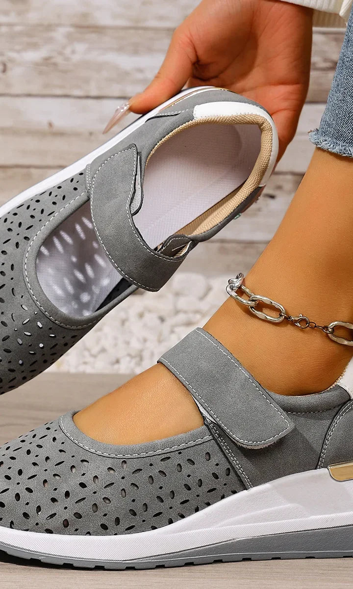 Side profile of a foot wearing a Soraya comfort arch support sandal, highlighting the elevated arch support.
