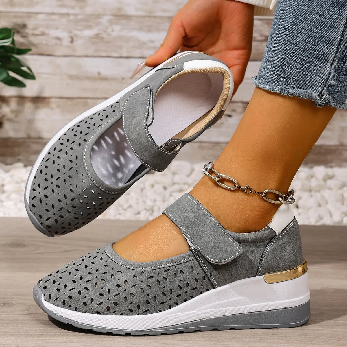Side profile of a foot wearing a Soraya comfort arch support sandal, highlighting the elevated arch support.