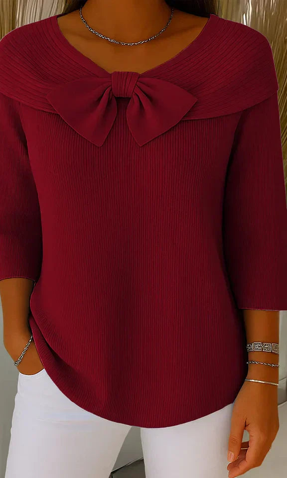 Back view of the Soraya relaxed knit tunic, showing its relaxed silhouette and how it drapes comfortably on the body.