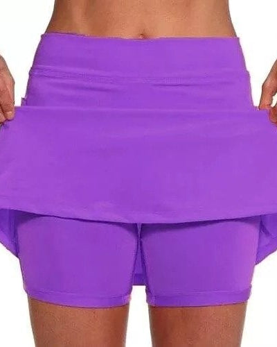 Front view of a blue-green anti-chafing active skort, showcasing its unique hue and active design.