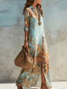 Woman strolling outdoors in the lightweight short sleeve maxi dress, styled with sandals for a resort look.