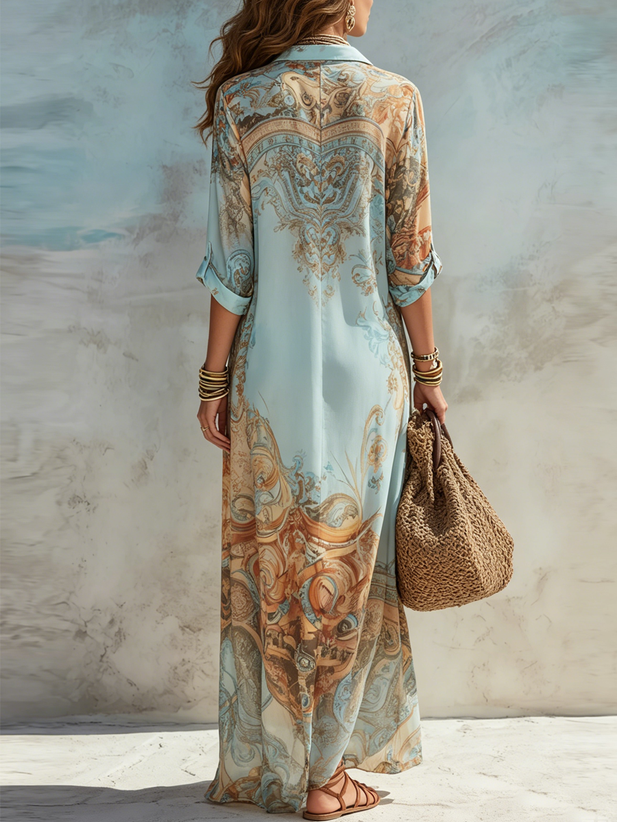 Detail shot of the collared neckline and rolled short sleeves of the floral chiffon maxi dress.