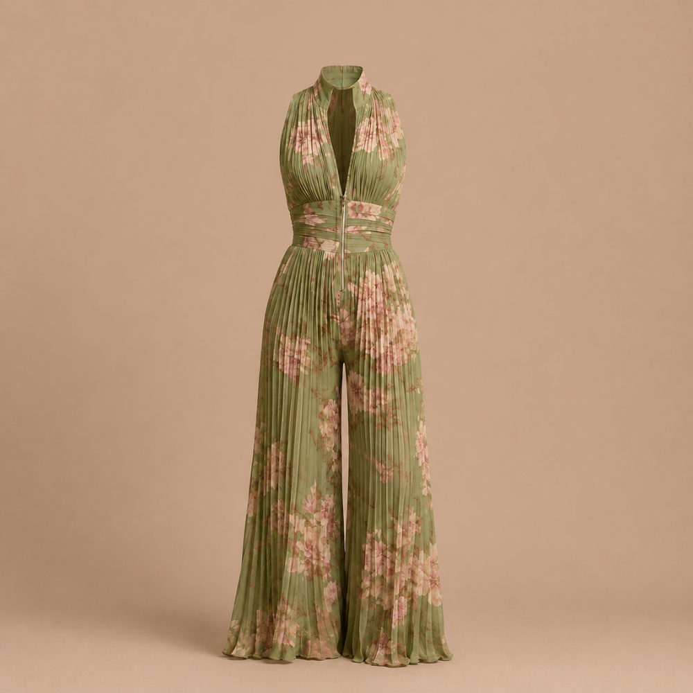 Close-up detail of the pleated design and V-neckline on the elegant green women's jumpsuit.