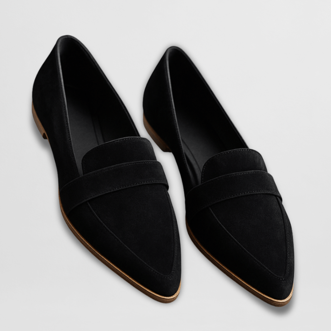Overhead view of a leopard print suede loafer, showing the interior lining and cushioned insole for comfort.